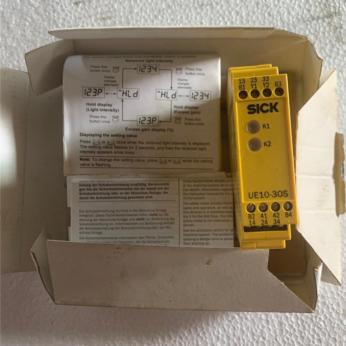 new 1 piece   sick UE10-30S2D0 safety relays in box ship