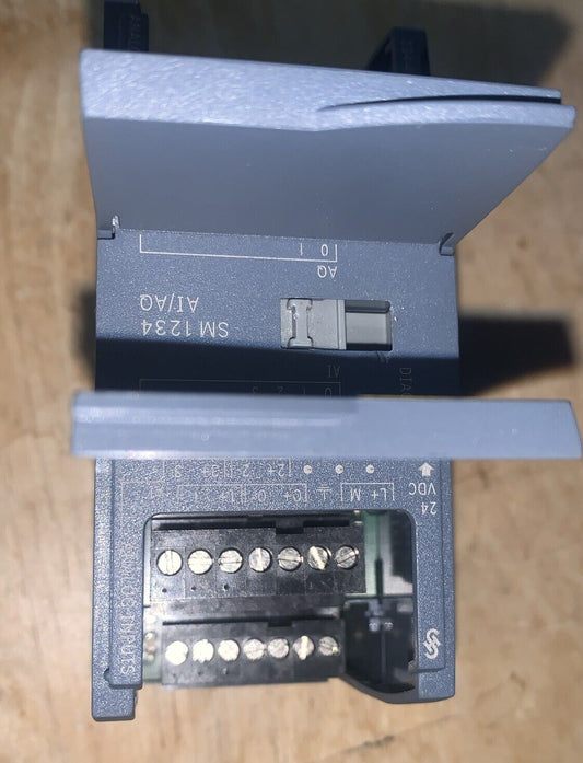 used Simatic S7-1200 SM 1234 AI/AQ 6ES7 234-4HE30-OXBO - SIMATIC