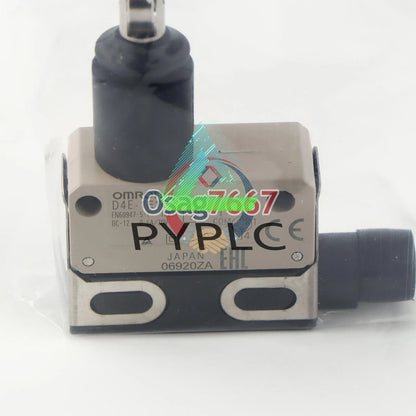 One Omron D4E-1E10N travel limit switch