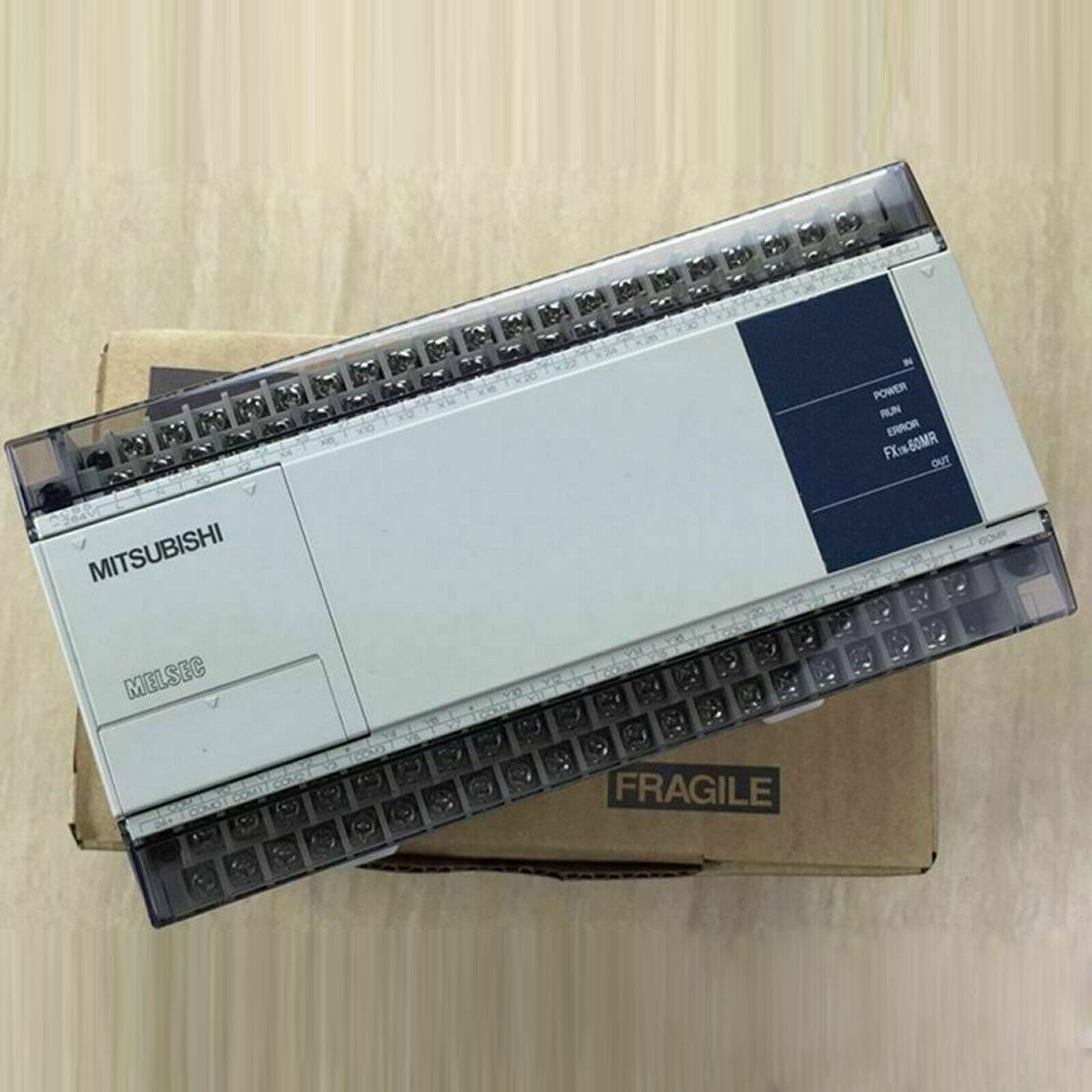 Mitsubishi Melsec FX1N60MR001 programmable logic controller with 40 I/O ports and 16-bit processing - MITSUBISHI