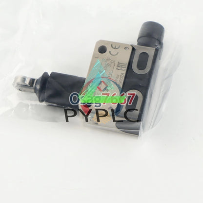One Omron D4E-1E10N travel limit switch
